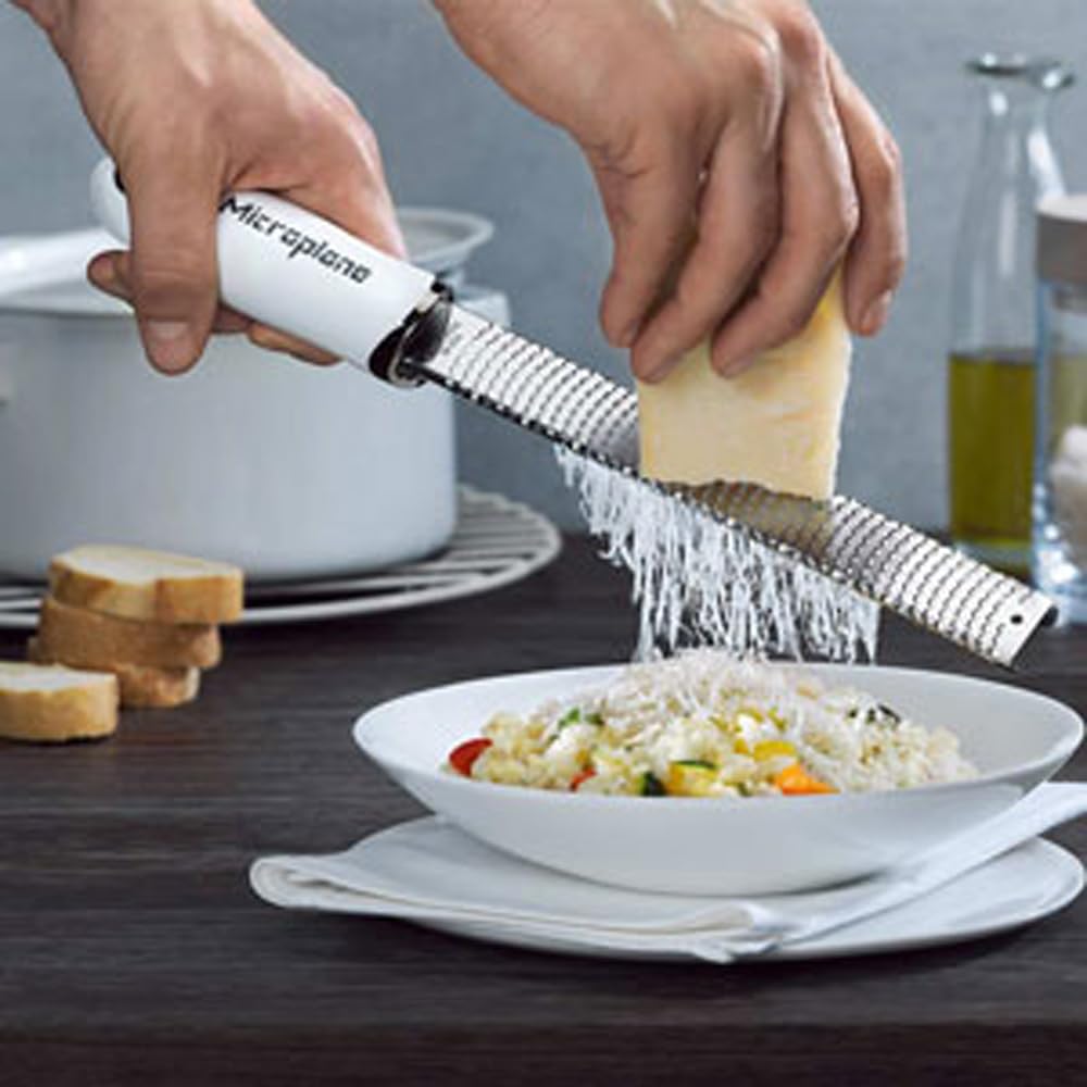 Microplane Premium Zester Grater - made in USA stainless steel blade -for zesting citrus and grating cheese -Soft touch handle -Dark Blue